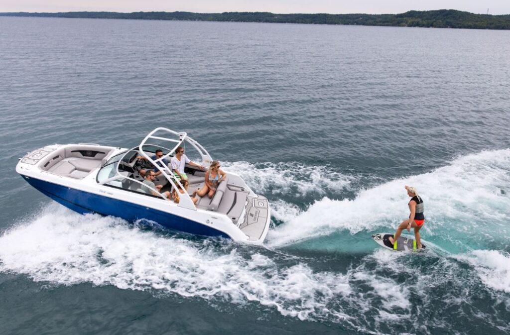 2023 Four Winns HD3 Surf with a blue hull, from a birds eye view