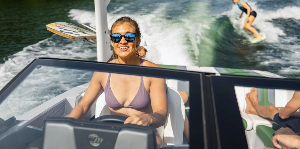 women driving the boat