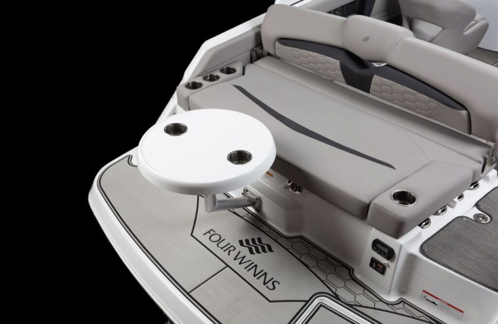 seating are on the back of the 2023 Four Winns HD3 with small table