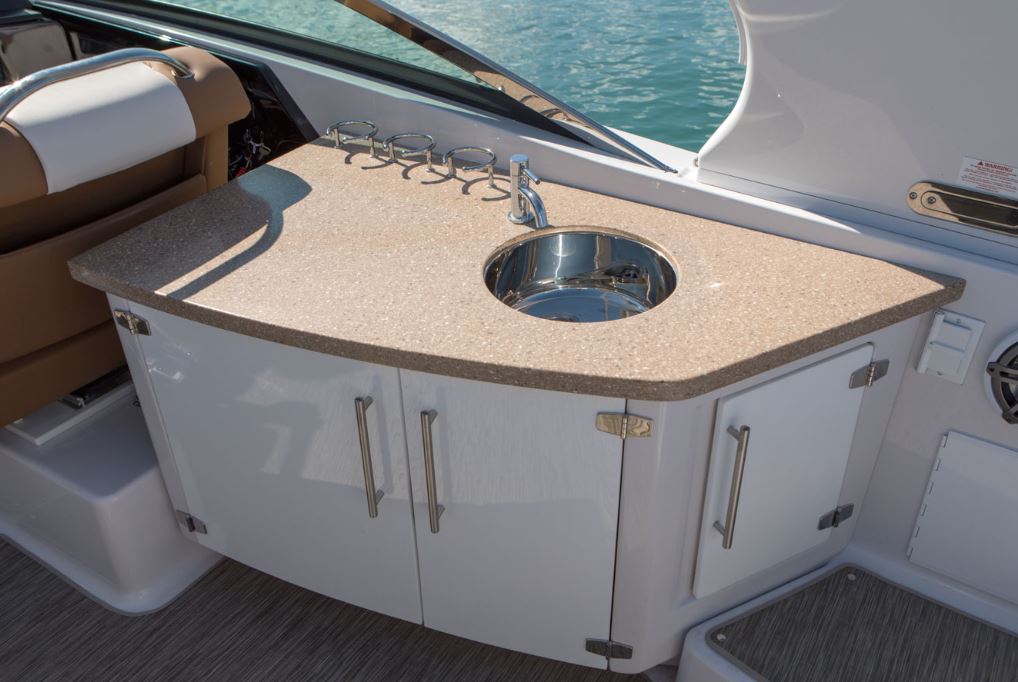 sink on the deck of the 2023 Four Winns Horizon 290 OB