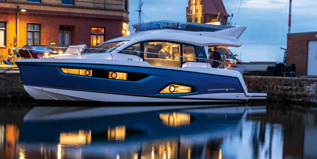 2023 Sealine F430 at night with interior lights on