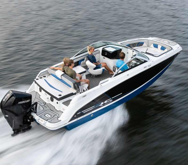 Four Winns with gray and blue hull with a white stripe