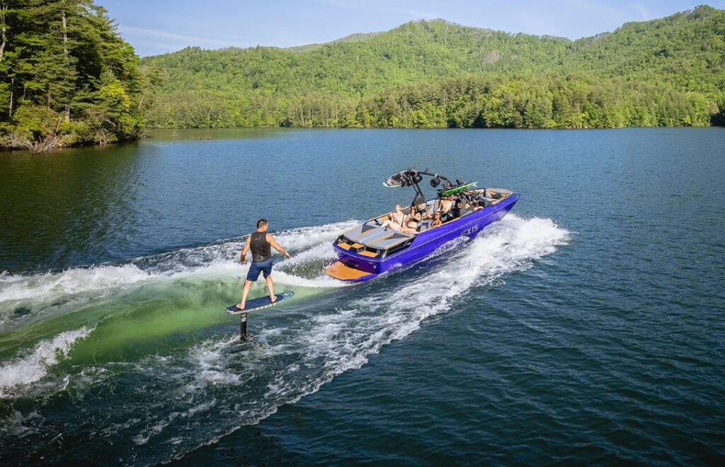 14 Axis with someone wake boarding behind it