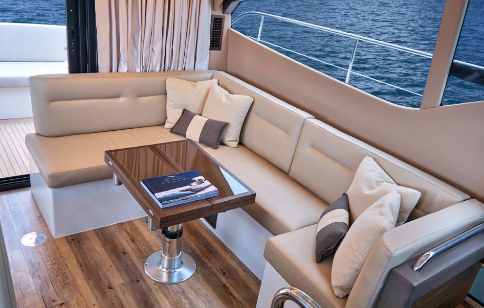 seating/ dinning area inside the 2023 Rodman Spirit 42 Fly