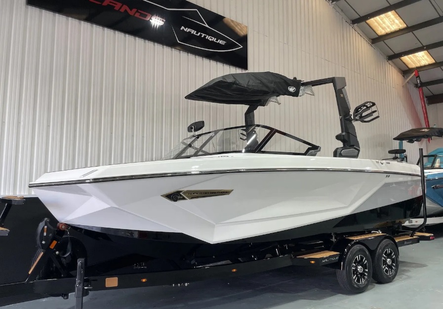 side view of Nautique G23 on trailer